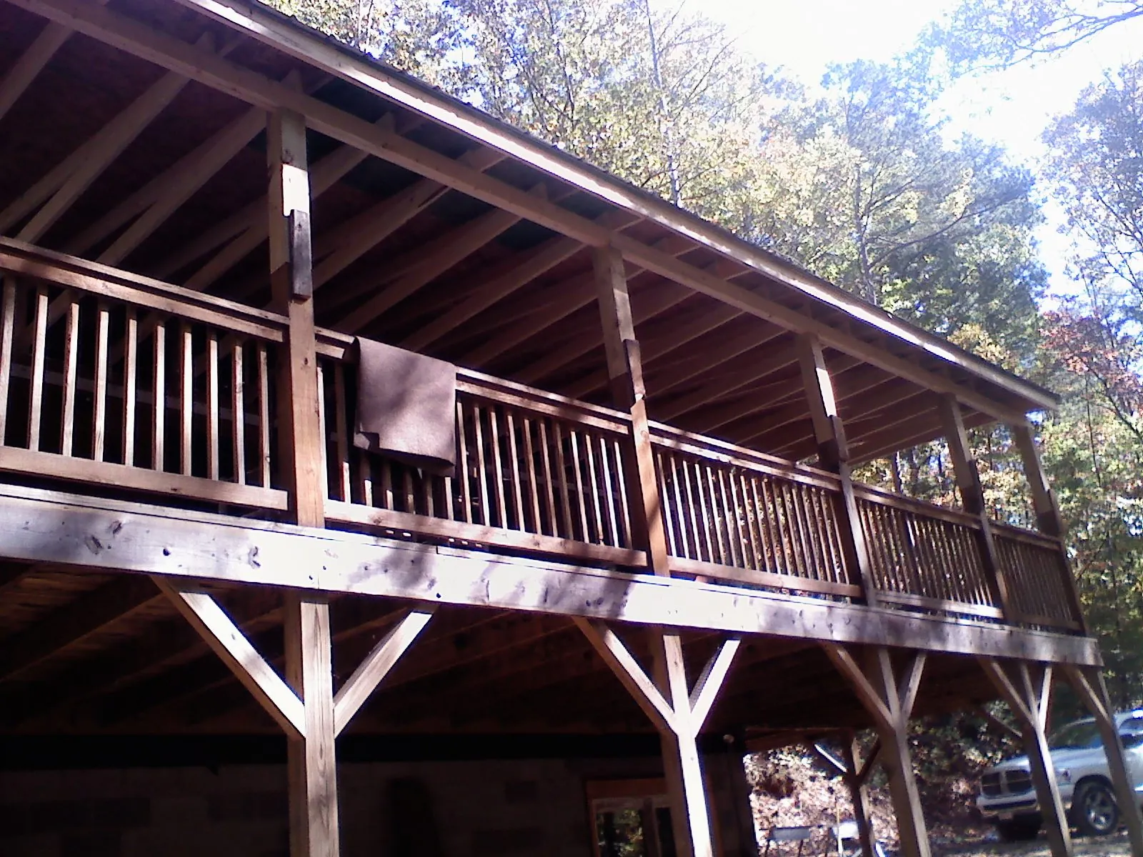 Timber framing under a new elevated porch and deck — Roof Leak Repair in Sumava Resorts by Roofing Brothers